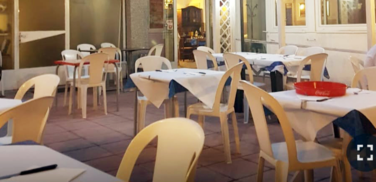 grilled chicken legs and chicken thighs on the flaming grill